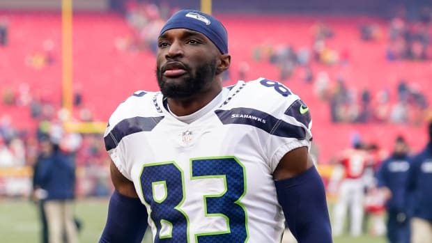 Seattle Seahawks wide receiver Dareke Young (83) leaves the field after a game against the Kansas City Chiefs at GEHA Field at Arrowhead Stadium.